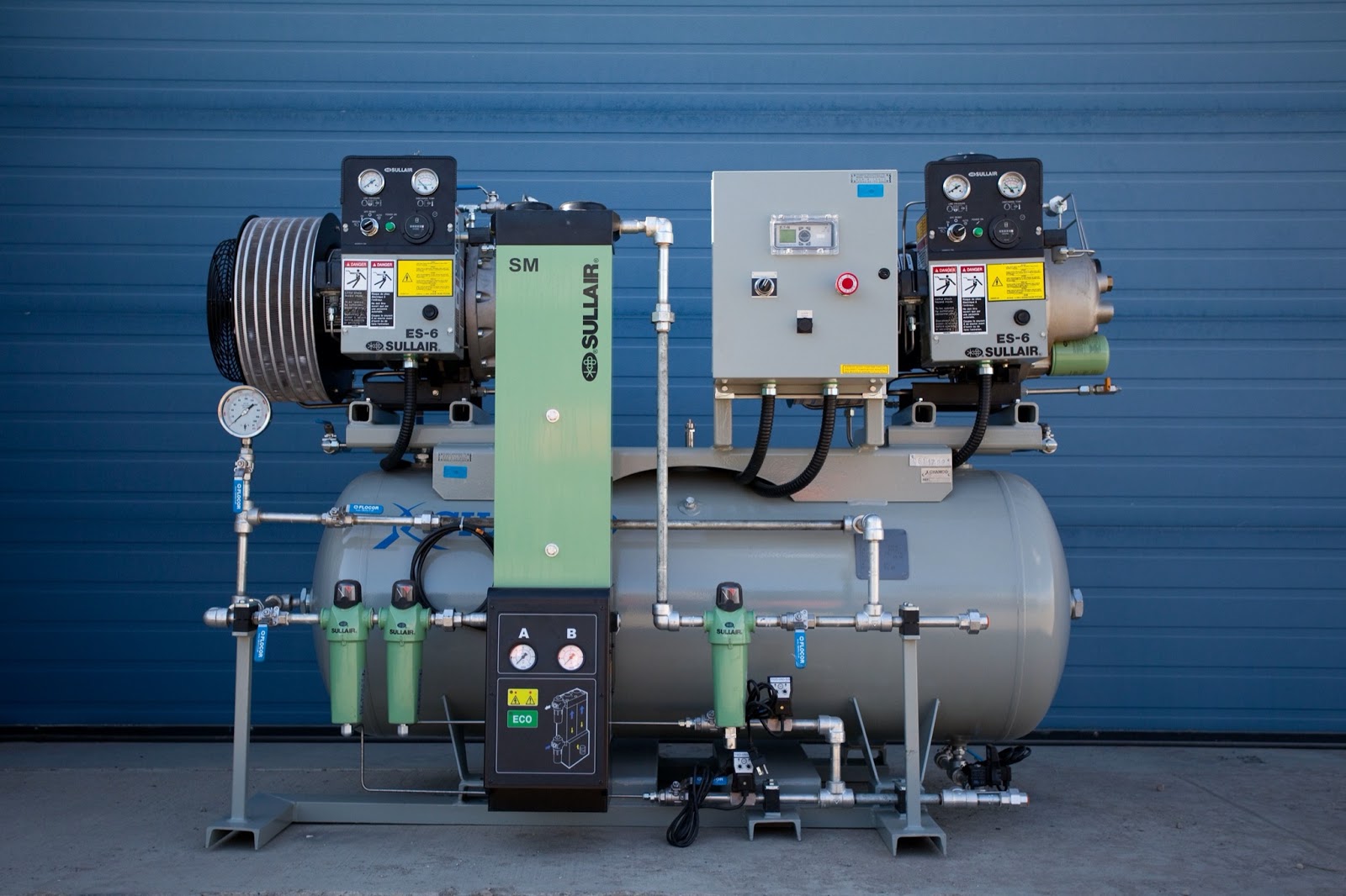 Skid-mounted air compression package